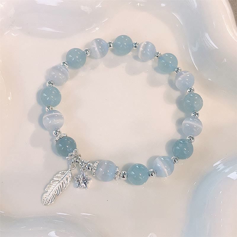 Fortune Jewel 925 Sterling Silver Aquamarine Cat's Eye Healing Feather Star Charm Bracelet
