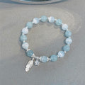 Fortune Jewel 925 Sterling Silver Aquamarine Cat's Eye Healing Feather Star Charm Bracelet