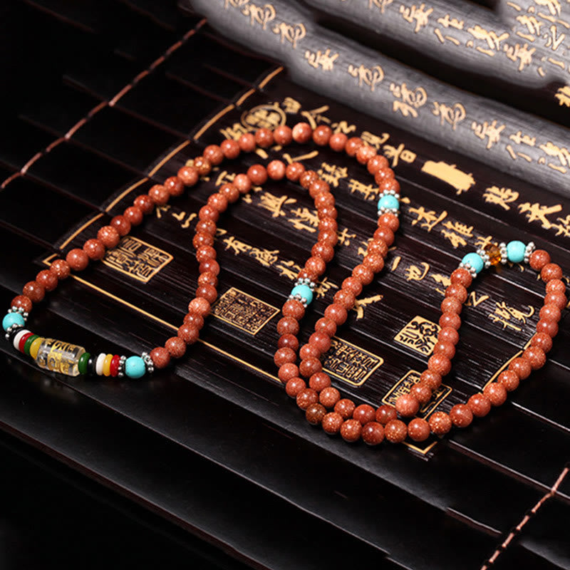 Fortune Jewel 108 Mala Beads Goldstone Om Mani Padme Hum Swastika Confidence Bracelet