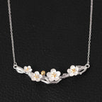 Fortune Jewel 925 Sterling Silver Plum Bossom Protection Necklace Pendant