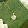 Fortune Jewel 925 Sterling Silver Magnolia Butterfly Hetian Jade Four Leaf Clover Blessing Earrings Necklace Pendant