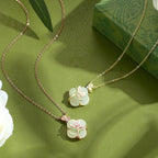 Fortune Jewel 925 Sterling Silver Magnolia Butterfly Hetian Jade Four Leaf Clover Blessing Earrings Necklace Pendant