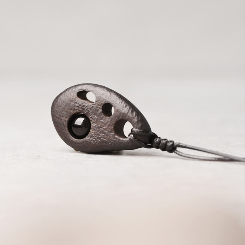 Fortune Jewel Ebony Wood Hollow Inlaid Obsidian Peace Calm Necklace Pendant