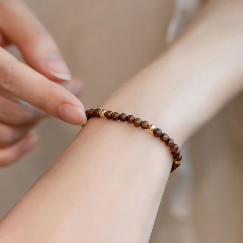 Fortune Jewel 4mm Ultra-thin Sandalwood 14K Gold Plated Copper Beads Protection Bracelet