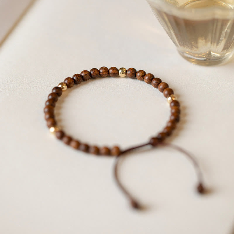 Fortune Jewel 4mm Ultra-thin Sandalwood 14K Gold Plated Copper Beads Protection Bracelet