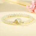 Fortune Jewel 925 Sterling Silver Natural Hetian Jade Autumn Chrysanthemum Peace Buckle Prosperity Bracelet
