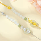 Fortune Jewel 999 Sterling Silver Natural Hetian Jade Peace Buckle Peach Blossom Luck Bracelet