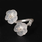 Fortune Jewel 925 Sterling Silver White Crystal Double Plum Blossom Flower Adjustable Protection Ring