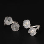 Fortune Jewel 925 Sterling Silver White Crystal Double Plum Blossom Flower Adjustable Protection Ring