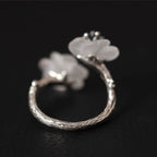 Fortune Jewel 925 Sterling Silver White Crystal Double Plum Blossom Flower Adjustable Protection Ring