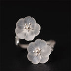 Fortune Jewel 925 Sterling Silver White Crystal Double Plum Blossom Flower Adjustable Protection Ring