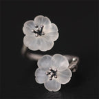 Fortune Jewel 925 Sterling Silver White Crystal Double Plum Blossom Flower Adjustable Protection Ring