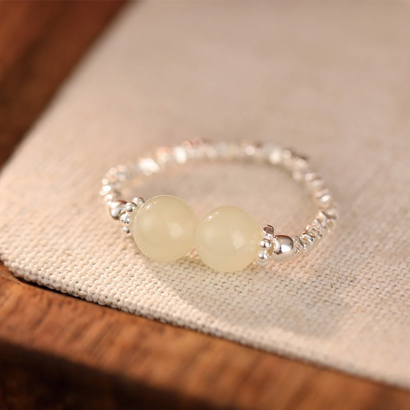 Fortune Jewel 925 Sterling Silver Natural Small Hetian Jade Bead Luck Elastic Ring