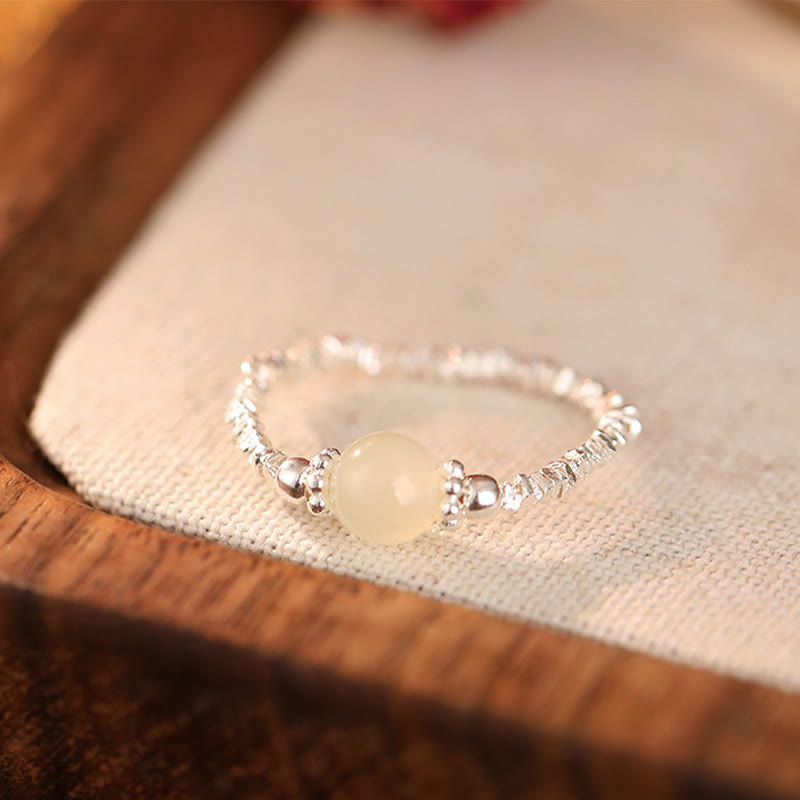 Fortune Jewel 925 Sterling Silver Natural Small Hetian Jade Bead Luck Elastic Ring