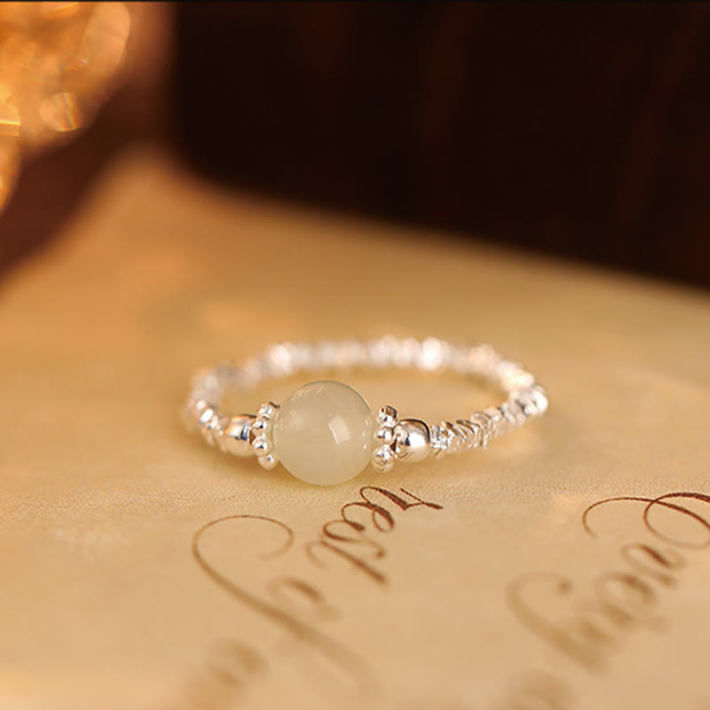 Fortune Jewel 925 Sterling Silver Natural Small Hetian Jade Bead Luck Elastic Ring