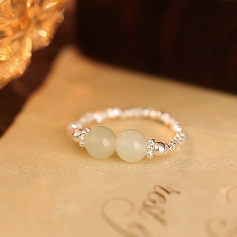 Fortune Jewel 925 Sterling Silver Natural Small Hetian Jade Bead Luck Elastic Ring