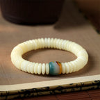 Fortune Jewel Natural White Bodhi Seed Stone Wisdom Tassel Wrist Mala Bracelet