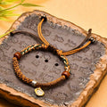 Fortune Jewel Handmade Tibetan Zakiram Goddess Of Wealth Wood Protection Braided Bracelet