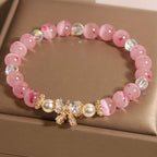 Fortune Jewel Cherry Blossom Pink Cat's Eye Pearl Bow-knot Rosette Support Bracelet