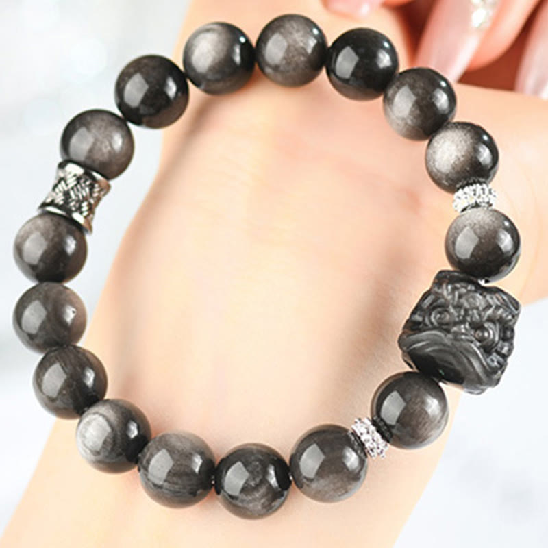 Fortune Jewel Natural Silver Sheen Obsidian Lion Dance Protection Bracelet