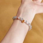 Fortune Jewel 925 Sterling Silver Natural Peach Blossom White Cat's Eye Positive Bracelet