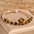 Fortune Jewel 14K Gold Filled Copper Natural Tiger Eye Protection Metal Cuff Bracelet Bangle