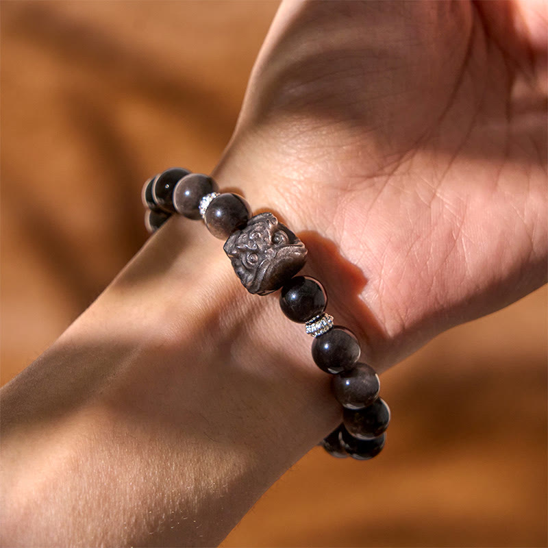 Fortune Jewel Natural Silver Sheen Obsidian Lion Dance Protection Bracelet