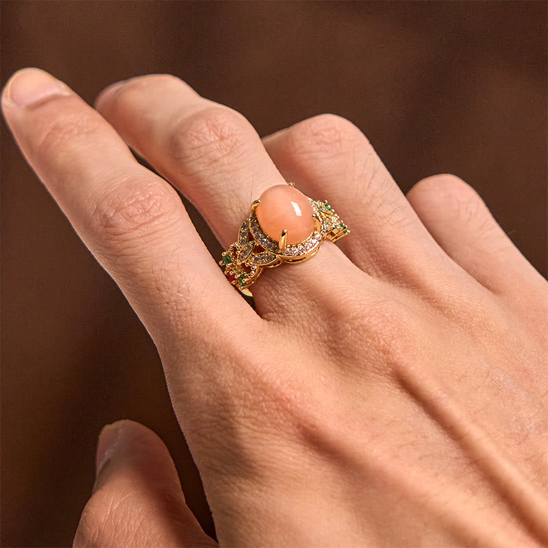 Fortune Jewel Vintage Prong Setting Four Leaf Flower Design Peach Moonstone Adjustable Soothing Ring