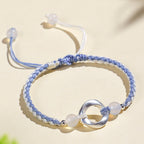 Fortune Jewel 925 Sterling Silver Mobius White Agate Bead Braided String Protection Bracelet