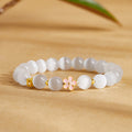 Fortune Jewel 925 Sterling Silver Peach Blossom Lucky Bag White Cat's Eye Luck Bracelet