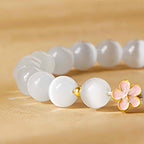 Fortune Jewel 925 Sterling Silver Peach Blossom Lucky Bag White Cat's Eye Luck Bracelet