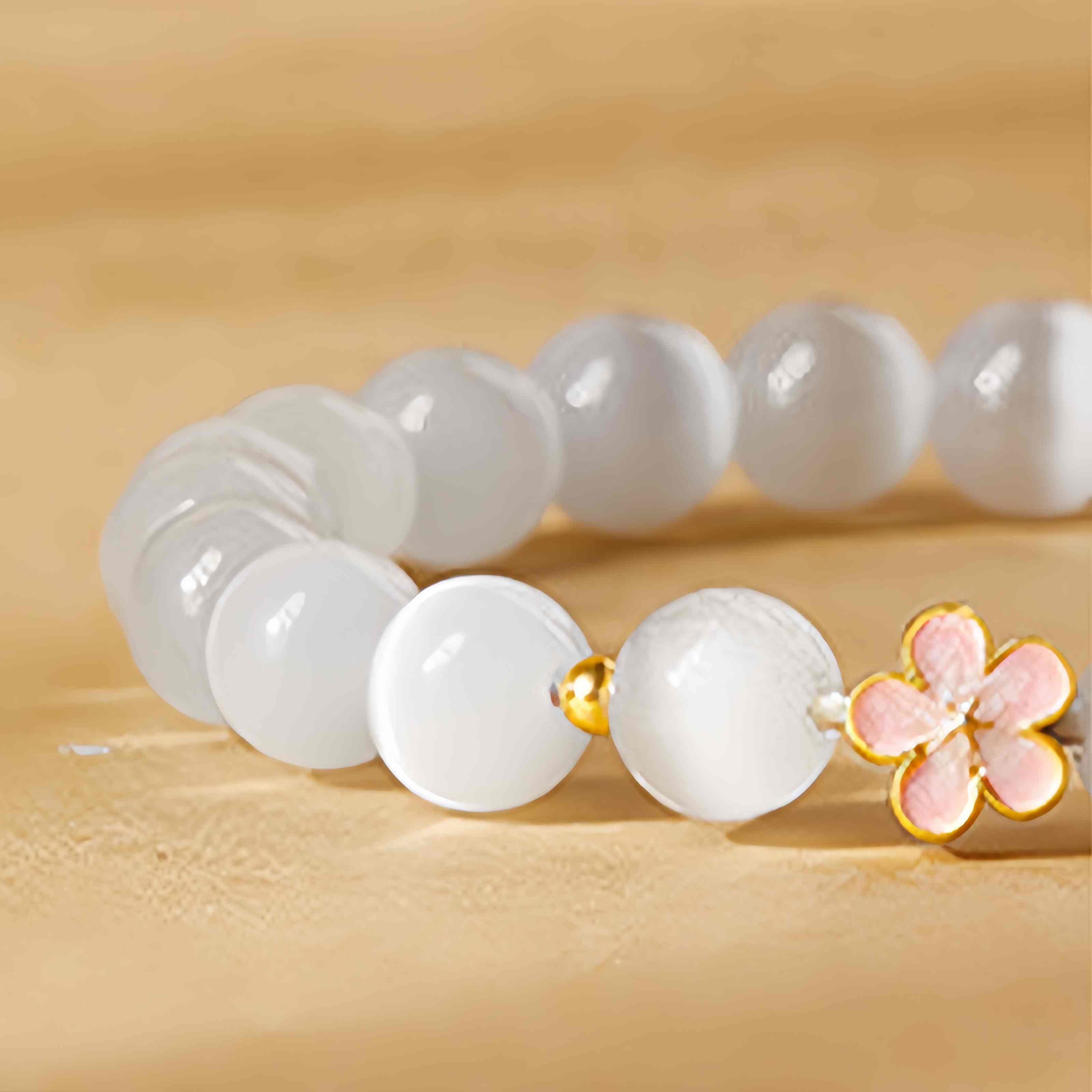 Fortune Jewel 925 Sterling Silver Peach Blossom Lucky Bag White Cat's Eye Luck Bracelet