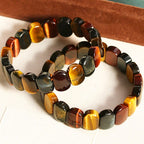 Fortune Jewel Natural Colored Tiger Eye Oval Beads Strength Bracelet