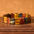Fortune Jewel Natural Colored Tiger Eye Oval Beads Strength Bracelet
