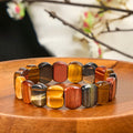 Fortune Jewel Natural Colored Tiger Eye Oval Beads Strength Bracelet