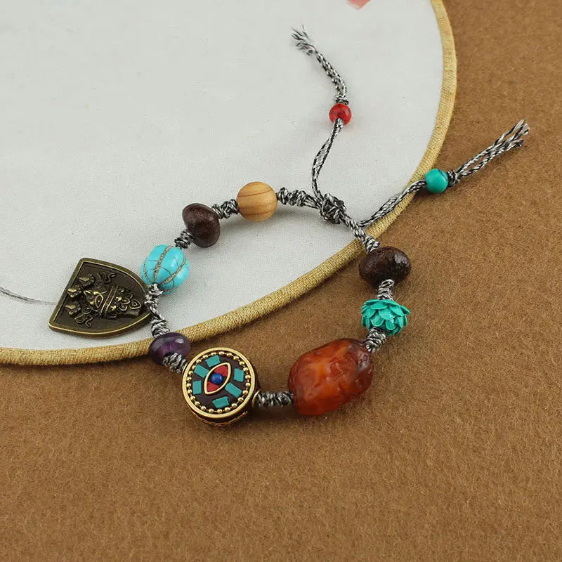 Fortune Jewel Tibetan Buddha's Eye Turquoise Lotus Zakiram Protection Rope Bracelet Fortune Jewel