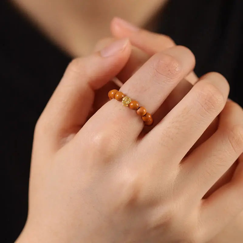 Fortune Jewel Olive Pit Bead Copper Coin Inner Strength Ring Fortune Jewel