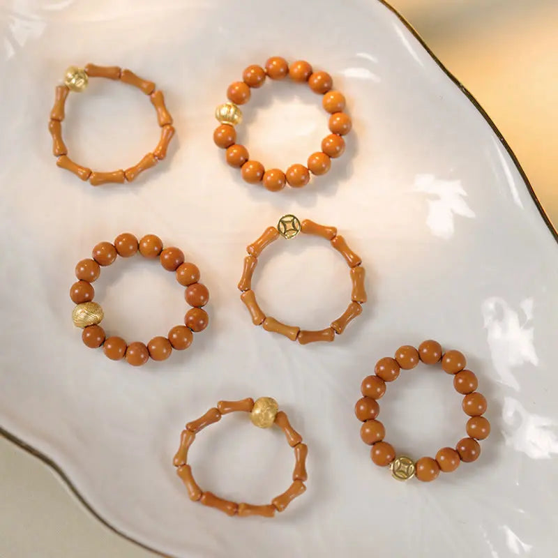 Fortune Jewel Olive Pit Bead Copper Coin Inner Strength Ring Fortune Jewel