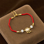 Fortune Jewel Chinese Lock Charm Cat's Eye Red String Copper Plated Gold Protection Bracelet - Fortune Jewel