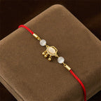 Fortune Jewel Chinese Lock Charm Cat's Eye Red String Copper Plated Gold Protection Bracelet - Fortune Jewel