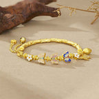 Fortune Jewel 925 Sterling Silver Butterfly Flower Balance Bracelet