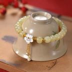 Fortune Jewel 925 Sterling Silver Natural Hetian Jade Luck Flower Bracelet