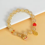 Fortune Jewel Natural Golden Rutilated Quartz Fu Character Charm Bell Wealth Bracelet