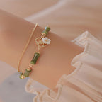 Fortune Jewel 14k Gold Plated Copper Peridot Bamboo Flower Wealth Double Layer Bracelet
