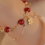 Fortune Jewel 14k Gold Plated Red Agate Star Flower Charm Calm Bracelet