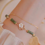 Fortune Jewel 14k Gold Plated Copper Peridot Bamboo Flower Wealth Double Layer Bracelet