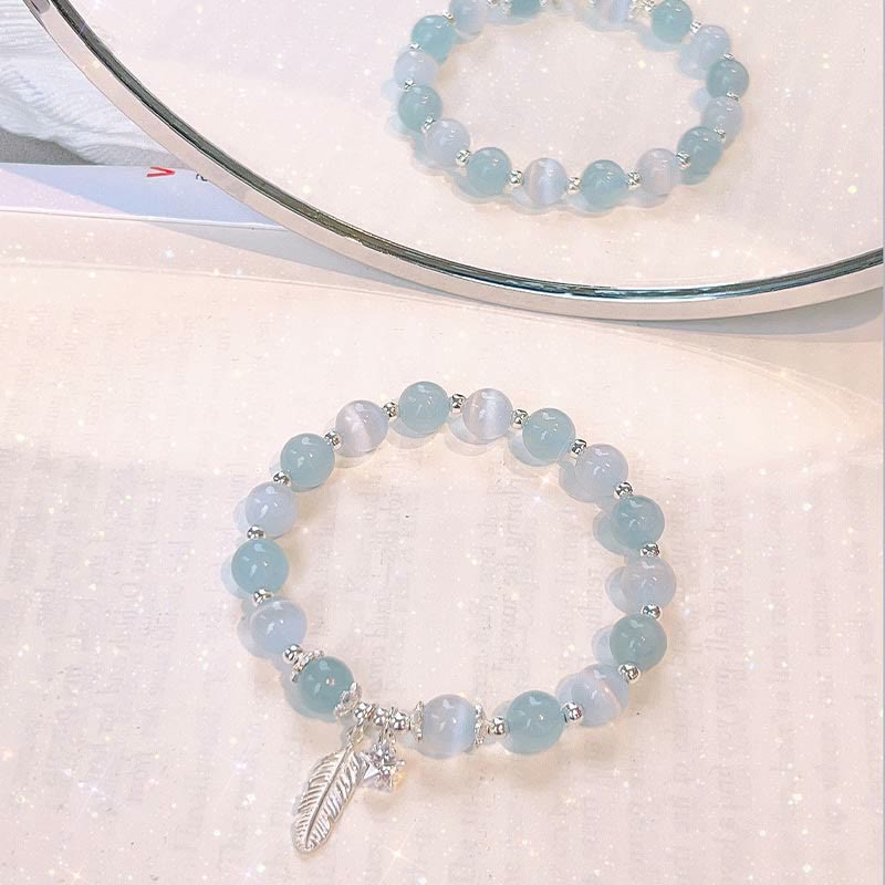 Fortune Jewel 925 Sterling Silver Aquamarine Cat's Eye Healing Feather Star Charm Bracelet