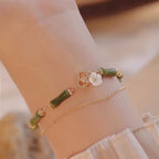 Fortune Jewel 14k Gold Plated Copper Peridot Bamboo Flower Wealth Double Layer Bracelet