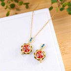 Fortune Jewel 925 Sterling Silver Tibet Lotus Prayer Wheel Red Agate Enlightenment Necklace Pendant