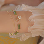 Fortune Jewel 14k Gold Plated Copper Peridot Bamboo Flower Wealth Double Layer Bracelet